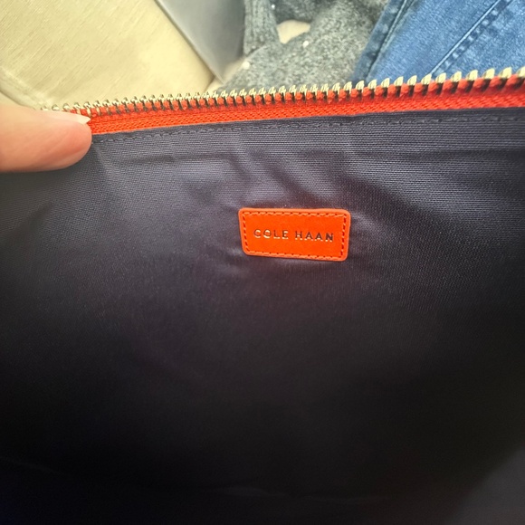 Cole Haan | Perforated Medium Leather Pouch | Spicy Orange - Picture 7 of 8